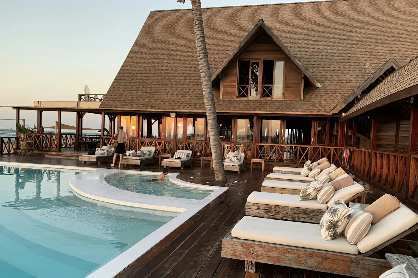 Resort buildings beside an outdoor swimming pool